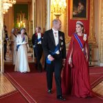 Kate shines in dark red silk at dazzling state banquet return